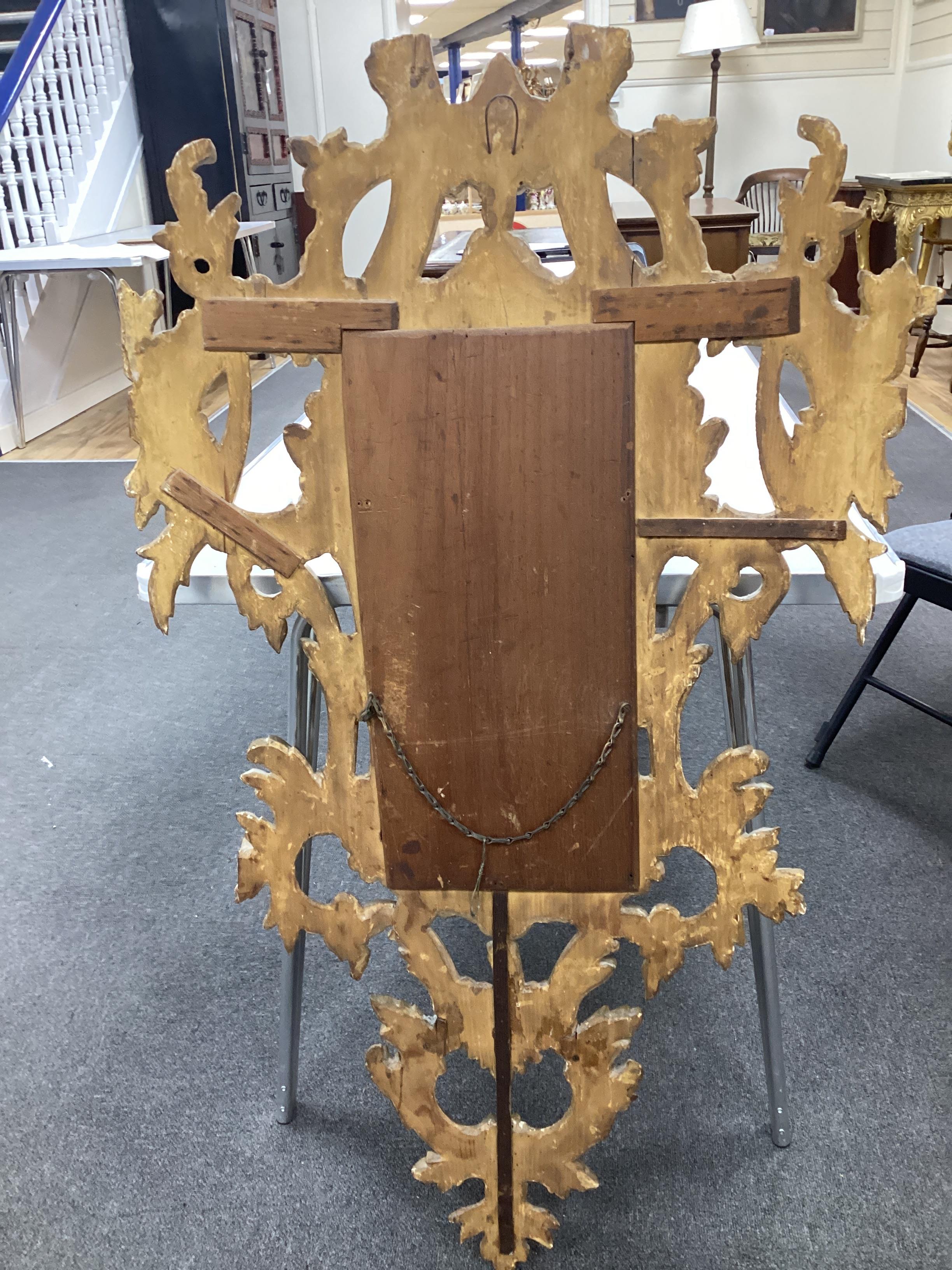 A pair of 18th century style carved giltwood wall mirrors, width 64cm, height 114cm